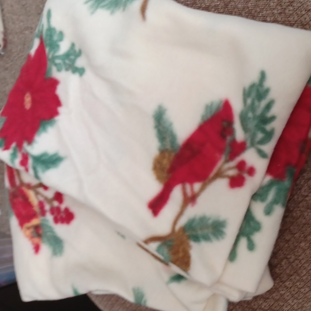 Fleece cardinal and poinsettia shams